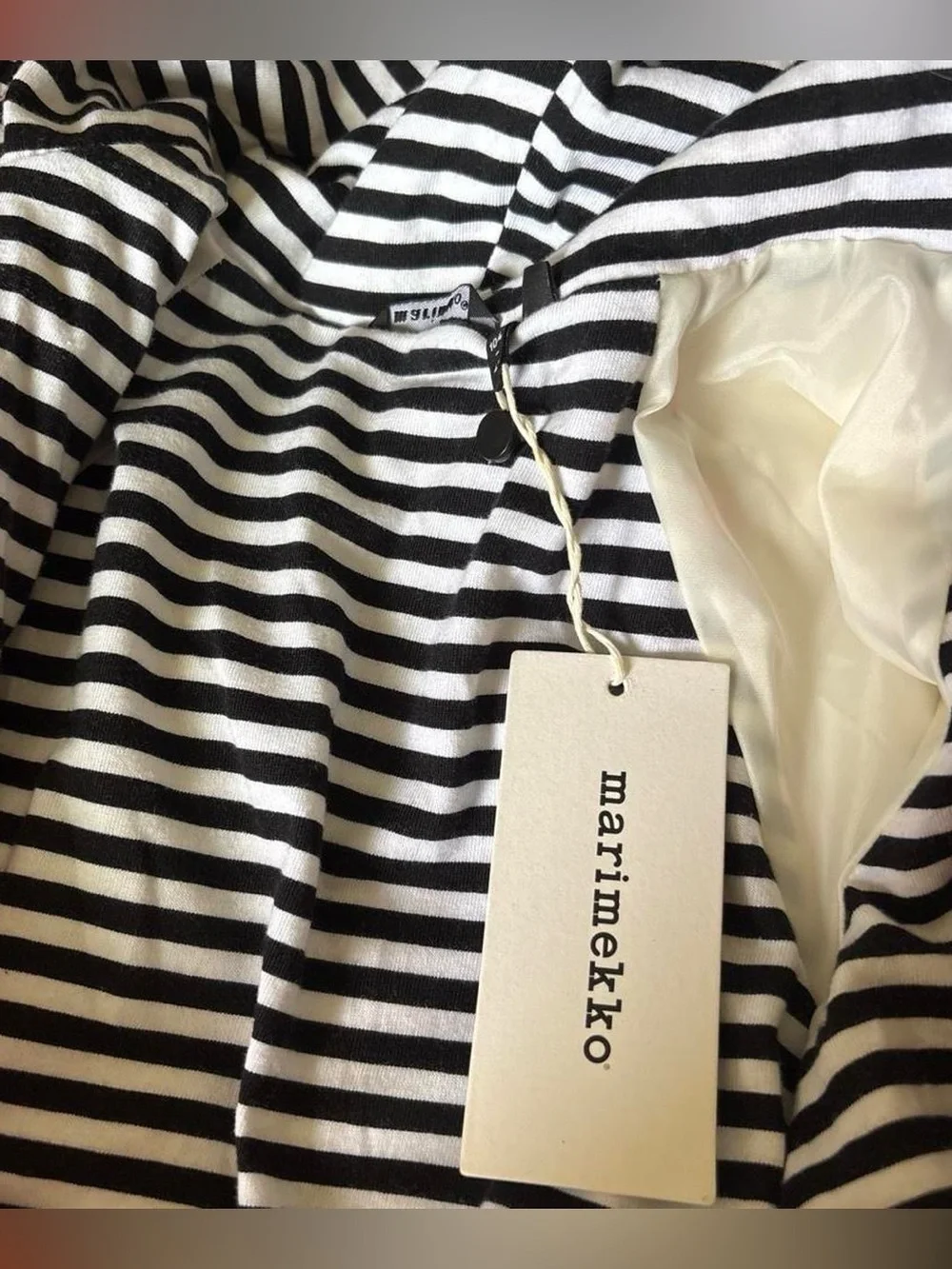 Marimekko red and white floral raincoat